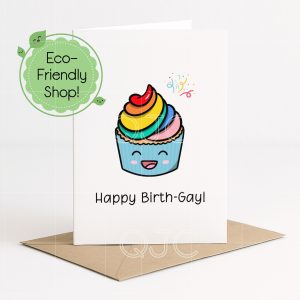 A 5inch by 7inch vertical white greeting card with a rainbow kawaii cupcake on the front with a kraft envelope