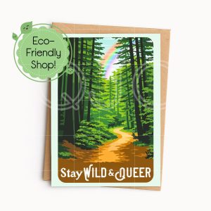 A Vertical 5 inch by 7 inch card with a rainbow, a forest path surrounded by trees and deer that reads Stay Wild and Queer with a kraft envelope