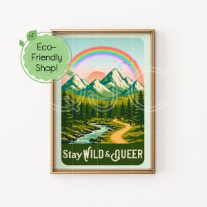 A green 5 inch by 7 inch print of a landscape with mountains, lush green forest, a blue river, dirt path with deer that says Stay Wild and Queer.